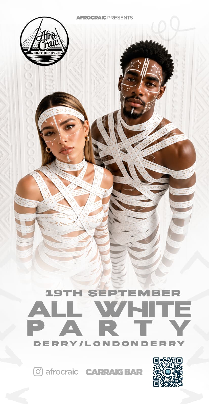 Two models in white body styling for the Afrocraic All White Party